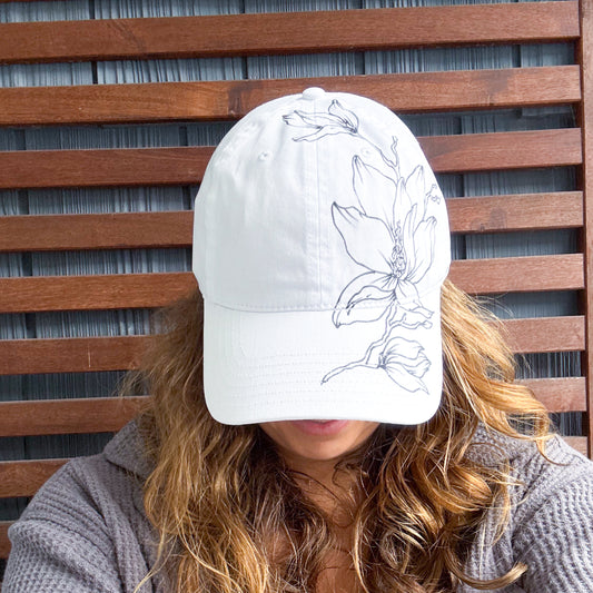 White Hand Drawn Magnolia Adjustable Baseball Cap
